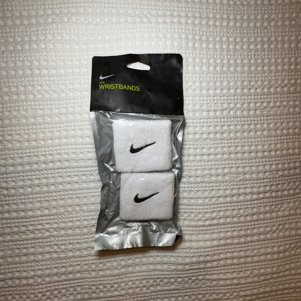 Brand new unopened pack of Nike wristbands.